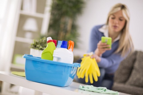 Local house clearance service sorting items in a Catford property